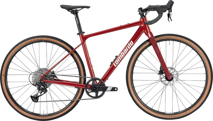Vista laterale della bicicletta Lombardo Maranello, evidenziando il telaio grigio elegante, le ruote con copertoni marroni e i componenti di alta qualità, progettata per il gravel riding.